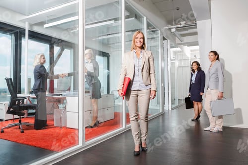 Preview: Woman standing outside interview room