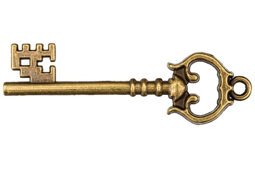 Vista previa: Llave de bronce, elemento decorativo para el diseño, aislada sobre fondo blanco