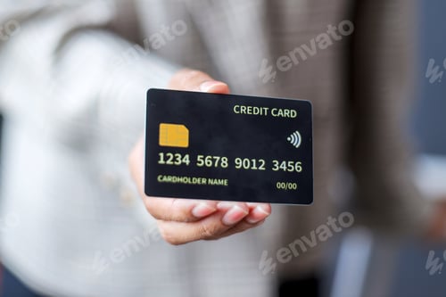 Preview: Business Hands Showing Credit Card