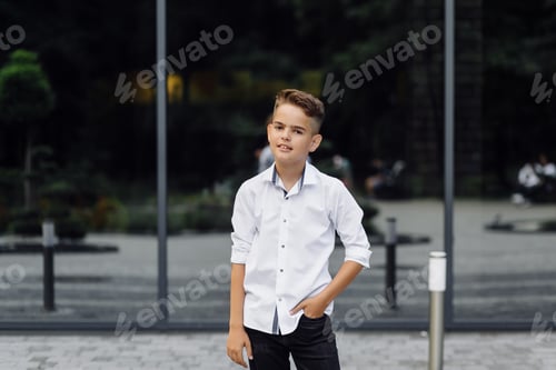 Preview: Boy in White Shirt Poses Outdoors