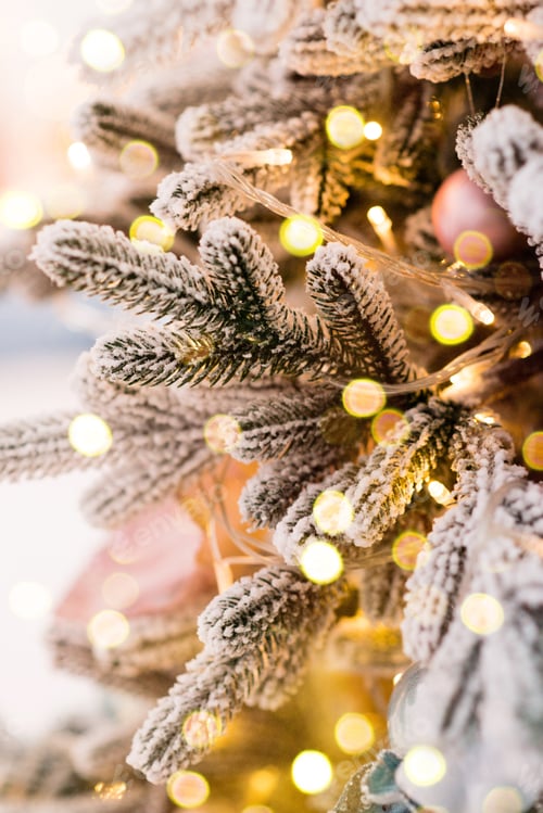 Preview: christmas balls on a tree with bokeh in the background, merry christmas, shallow depth of field