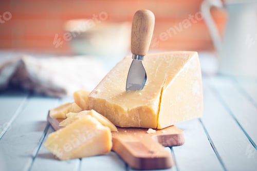Preview: parmesan cheese on cutting board