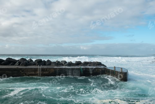 Preview: Sea waving near stone pier
