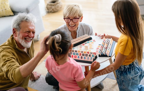 Preview: Happy grandparents having fun times with children at home