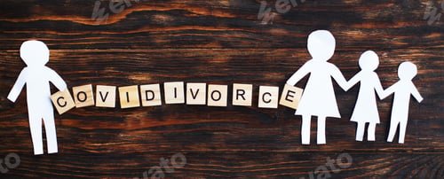 Preview: Paper chain cut family with broken heart on wooden background. divorce in the covid pandemic