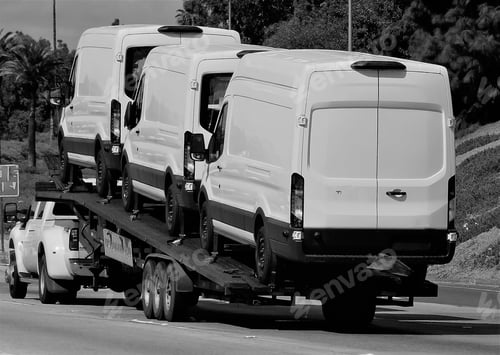 Preview: New White Delivery Vans Transported on Flatbed Truck
