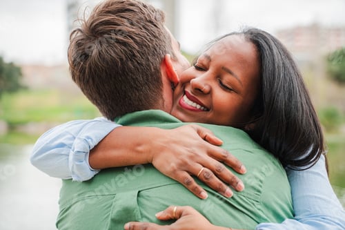 Preview: Joyful couple sharing a heartfelt embrace filled with warmth, love, and affection