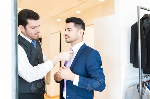 Preview: Man Getting Ready In Tailor Shop