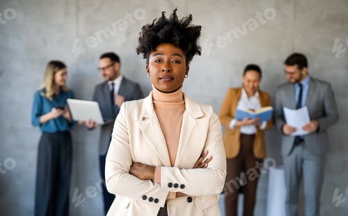 Preview: Successful executive standing proudly in office, representing business growth, partnership