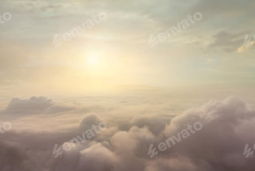 Preview: Beautiful sunrise above clouds view from airplane