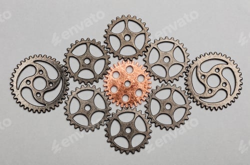 Preview: Rose-gold cogwheel and bunch of silver cogwheels