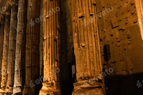 Preview: ROME, ITALY - JUNE 28, 2019: concrete wall and ancient columns