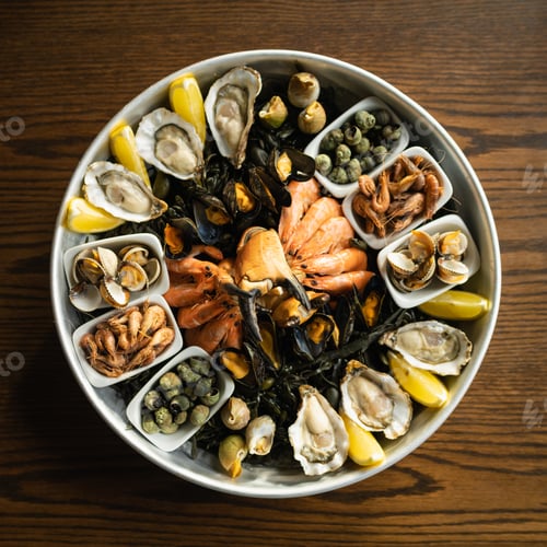 Preview: Top view of appetizing seafood mix on a wooden table