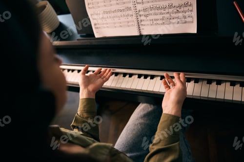 Preview: Woman Is Focus While Playing Piano