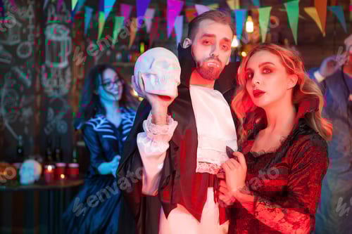 Preview: Sexy couple dressed up like vampires for halloween party