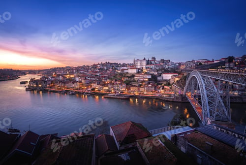 Preview: Illuminated Porto Skyline with Douro River and Dom Luis I Bridge at sunset - Porto, Portugal