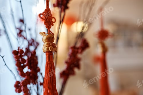 Preview: Close up of golden rabbit on branch as decoration for Chinese New Year.