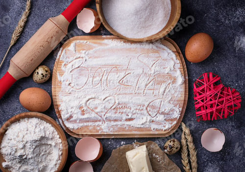 Preview: Egg, flour, sugar, butter and board with text Backing