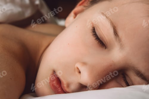 Preview: Girl sleeping in bed