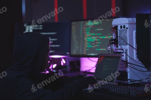 Preview: Unrecognizable Hacker in Dark