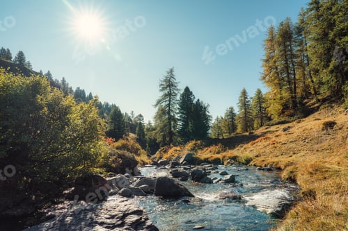 Preview: Claree Valley with autumn forest and river flowing on sunny day