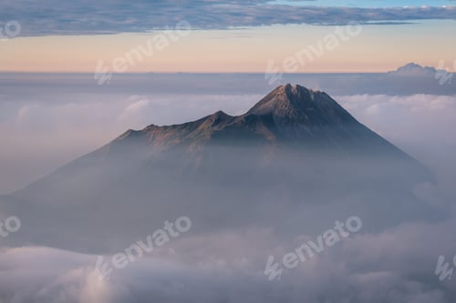 Preview: Aerial view of Mount Merapi covered in clouds and fog, in Indonesia
