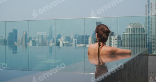 Preview: Woman enjoy in the swimming pool