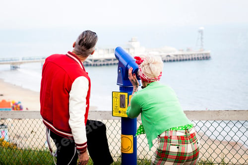 Preview: Quirky couple using tower viewer, Bournemouth, England