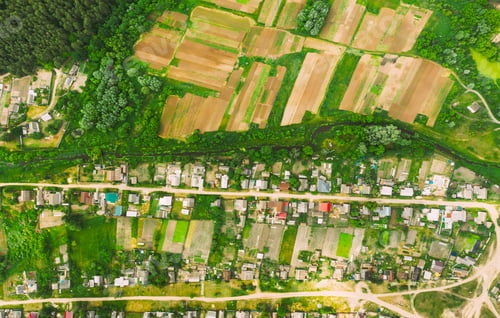Preview: Aerial View Of Vegetable Gardens In Small Town Or Village. Skyline In Summer Evening. Village Garden
