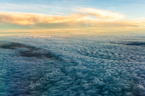 Preview: blue sky with the clouds from the plane view