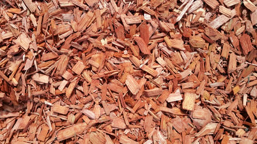Preview: Natural background of red mulch, close up photo