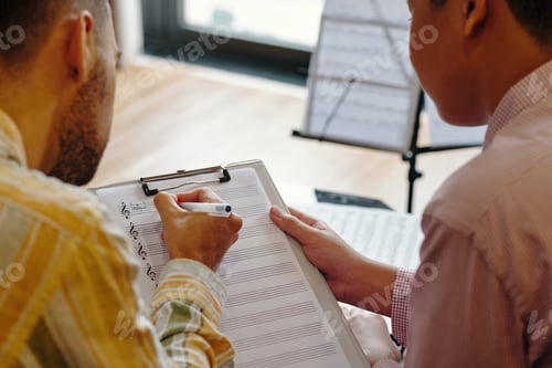 Preview: Reviewing Musical Scores at Workstation Desk