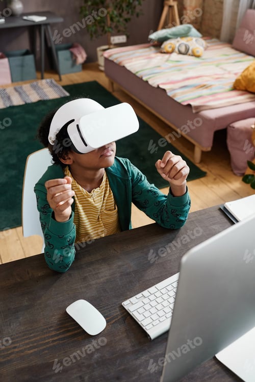 Preview: African little boy playing VR game