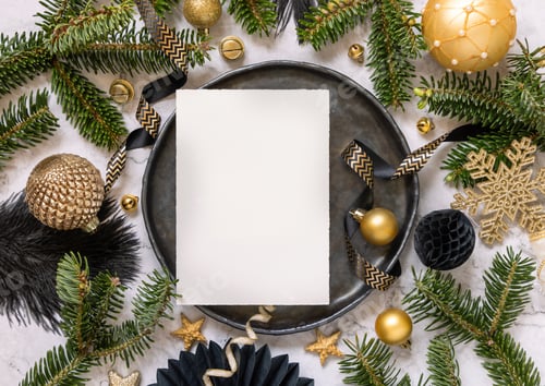 Preview: Black and golden Christmas Table setting with ornaments and fir tree branches. Menu card Mockup