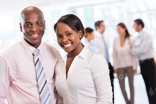 Preview: Black Business Couple Looking Happy At The Office