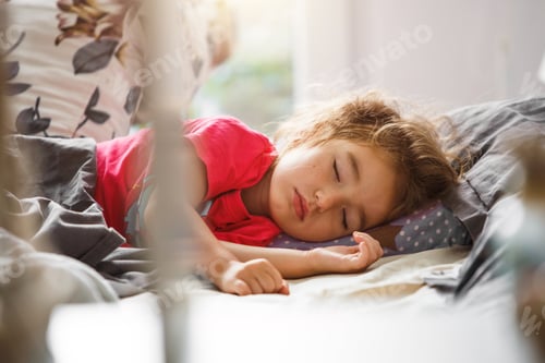 Preview: A small child sleeps sweetly in his bed. Healthy sleep of the girl, ventilation.