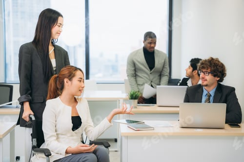 Preview: Businesswoman holding a meeting, conference, and conversation with his team at the workplace.