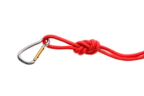 Preview: close-up view of red rope with knot and carabiner isolated on white