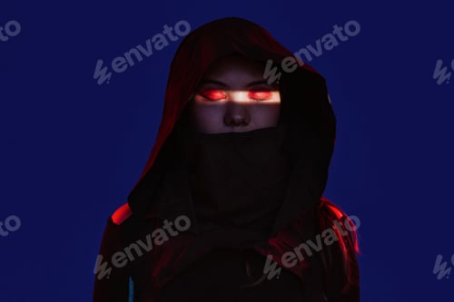 Preview: Woman in hooded cloak with glowing red eyes