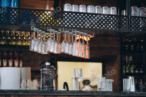 Preview: Bar counter and hanging glasses
