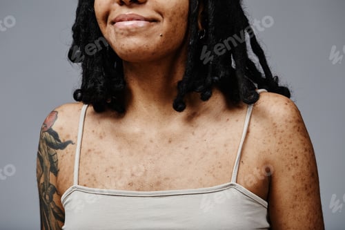 Preview: Closeup of young black girl with real skin texture