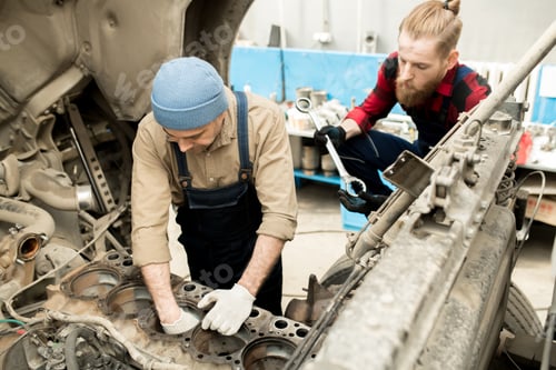 Preview: Car Mechanics Repairing Truck