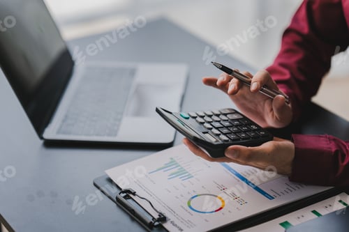 Preview: Portrait of office worker working on tablet computer in modern office make account analysis report R