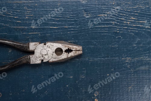 Preview: Pliers On Blue Table