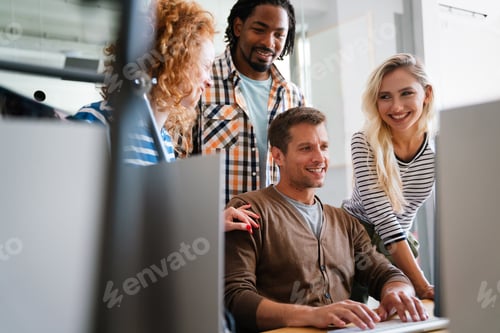 Preview: Programmers cooperating at IT company developing apps. Business people technology concept