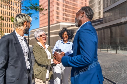 Preview: Business people greeting in an outdoors meeting