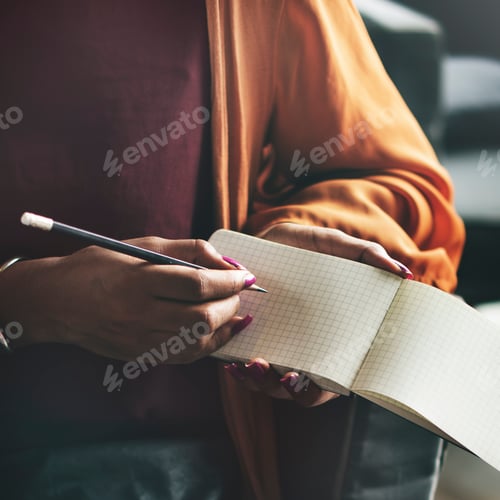 Preview: Hand writing note to a notebook
