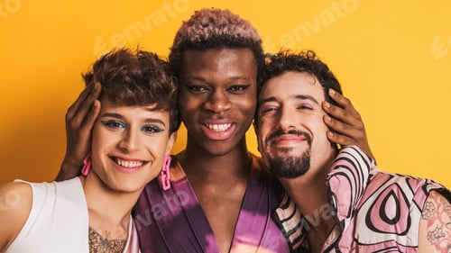 Preview: Multiracial transgender men smiling at the camera together