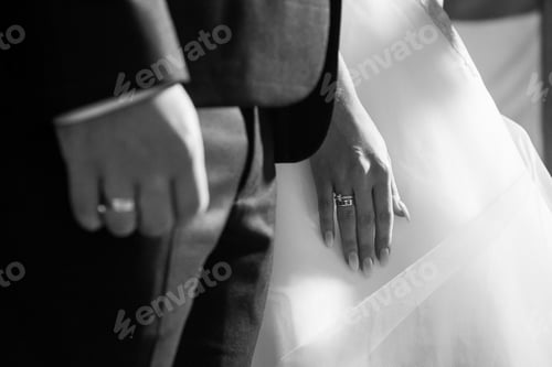 Preview: Golden wedding rings for newlyweds on their wedding day