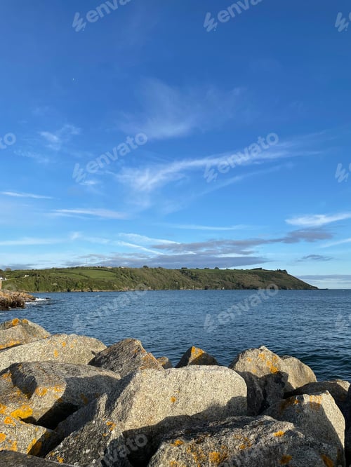 Preview: A vertical shot of rocks near the ocean
